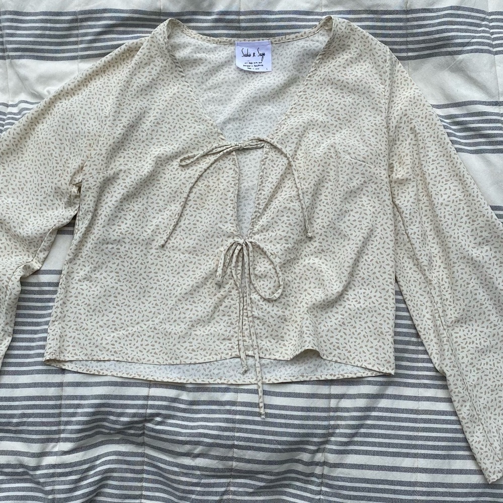 White and beige patterned shirt